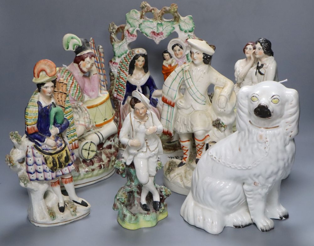 A collection of Staffordshire figures, including a flatback entitled Fortune Teller, height 32cm,